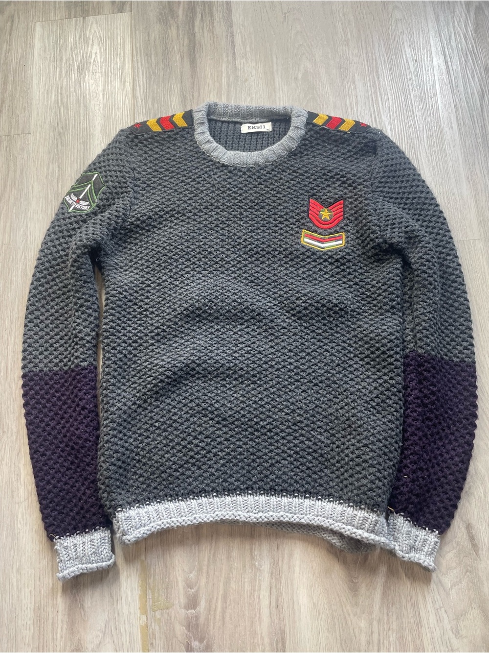 Levi's Charcoal Crewneck Sweater with Purple Sleeve Panels and Red Badge